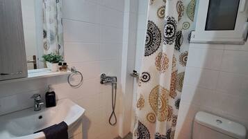 Hair dryer, towels, soap, toilet paper