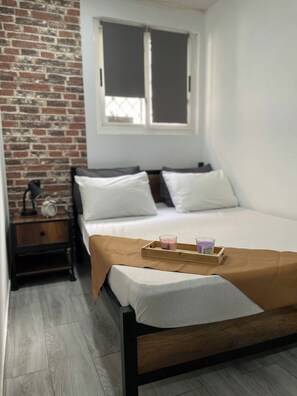 2 habitaciones, tabla de planchar con plancha, wifi y ropa de cama 