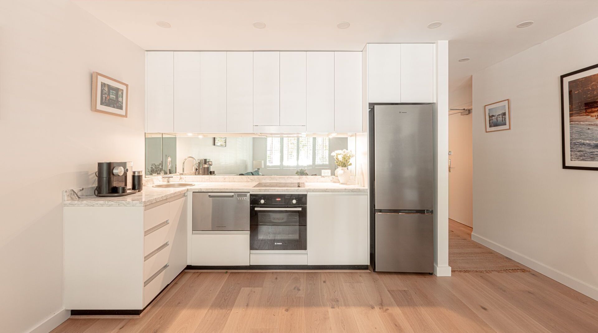 Fridge, stovetop, dishwasher, coffee/tea maker