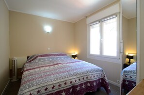 Apartamento | 2 dormitorios y tabla de planchar con plancha