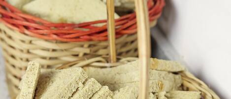 A wicker basket filled with sliced bread.