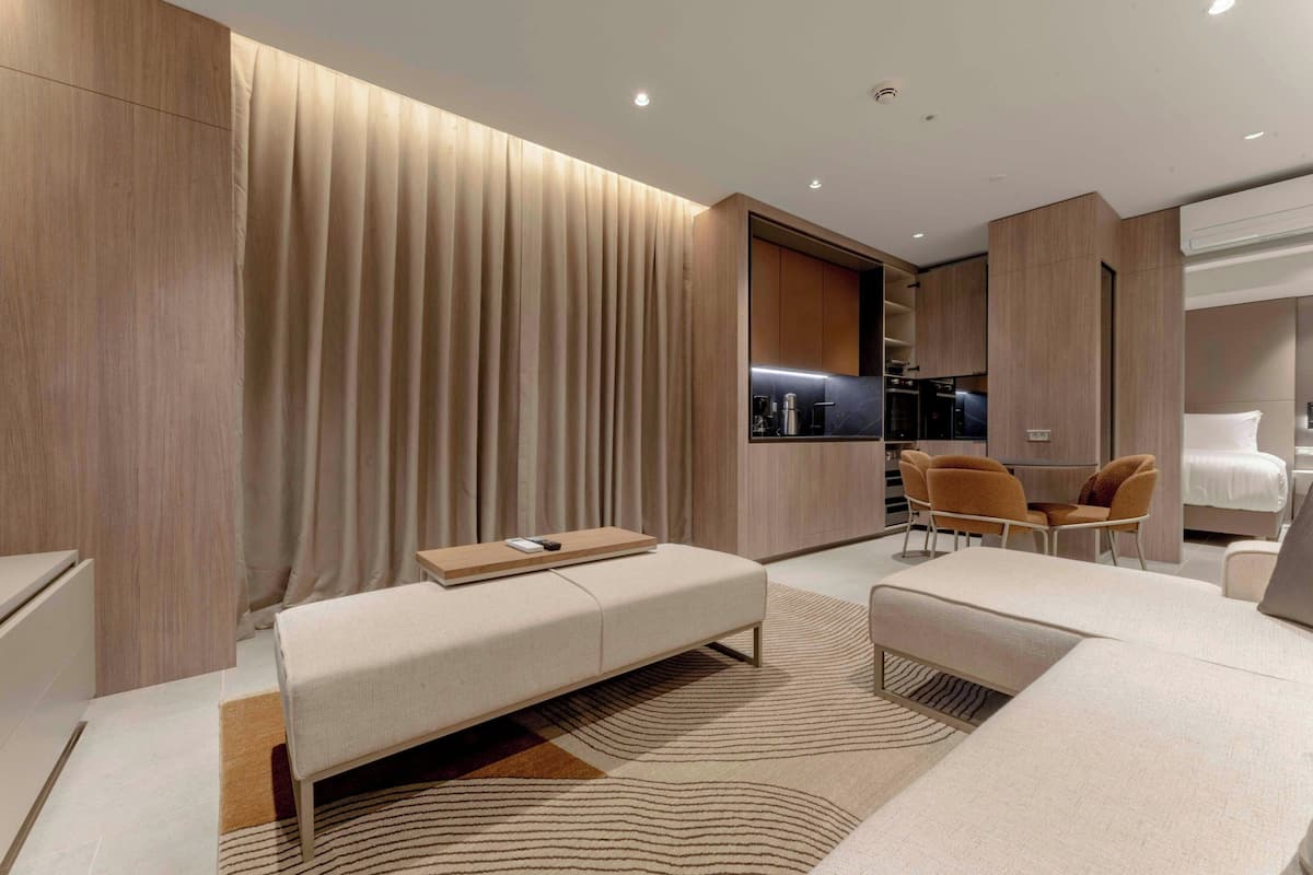 Suite, 1 Bedroom, City View | Living room | 55-inch Smart TV with digital channels