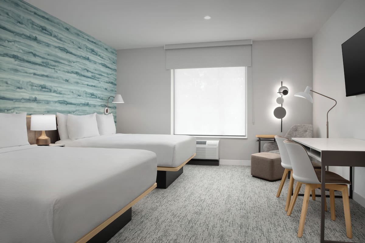 Hypo-allergenic bedding, in-room safe, desk, laptop workspace