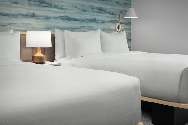 Hypo-allergenic bedding, in-room safe, desk, laptop workspace