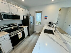 Fridge, microwave, oven, stovetop - Nautical-Themed, Light and Bright Townhouse in Ocean Edge Resort's Howland Village! (Brewster)