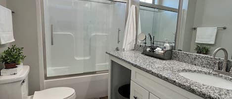Hair dryer, towels, soap, toilet paper
