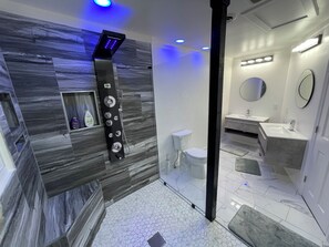Shower, hair dryer, towels, soap