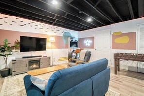 Smart TV, fireplace, video games, table football
