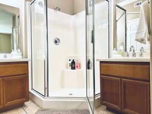 Shower, hair dryer, towels, soap