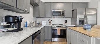 Steps from the Beach with a pool!