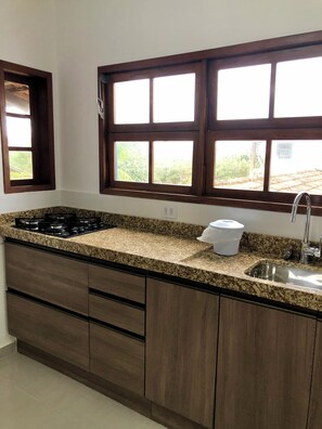 Family Apartment, Balcony, Courtyard View | Private kitchen - Pousada Natur Campeche (Florianópolis)