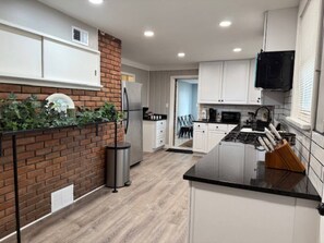 Fridge, microwave, oven, stovetop - Newly Renovated Gem Fenced Backyard 2 Full Baths (Allen Park)