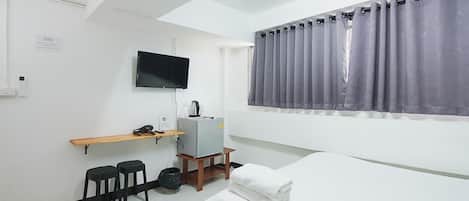Quarto standard, vista para a cidade | Wi-Fi de cortesia