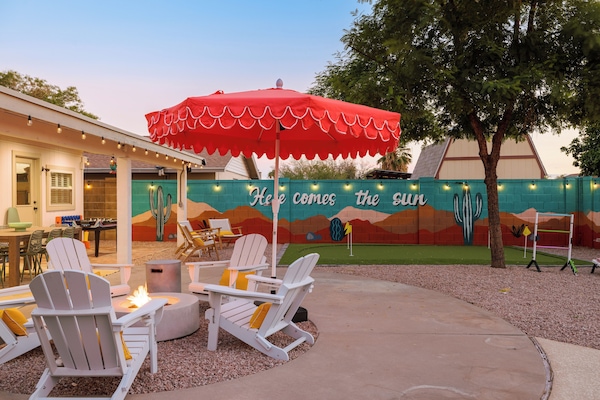 Outdoor firepit, mural art & putting green for group fun