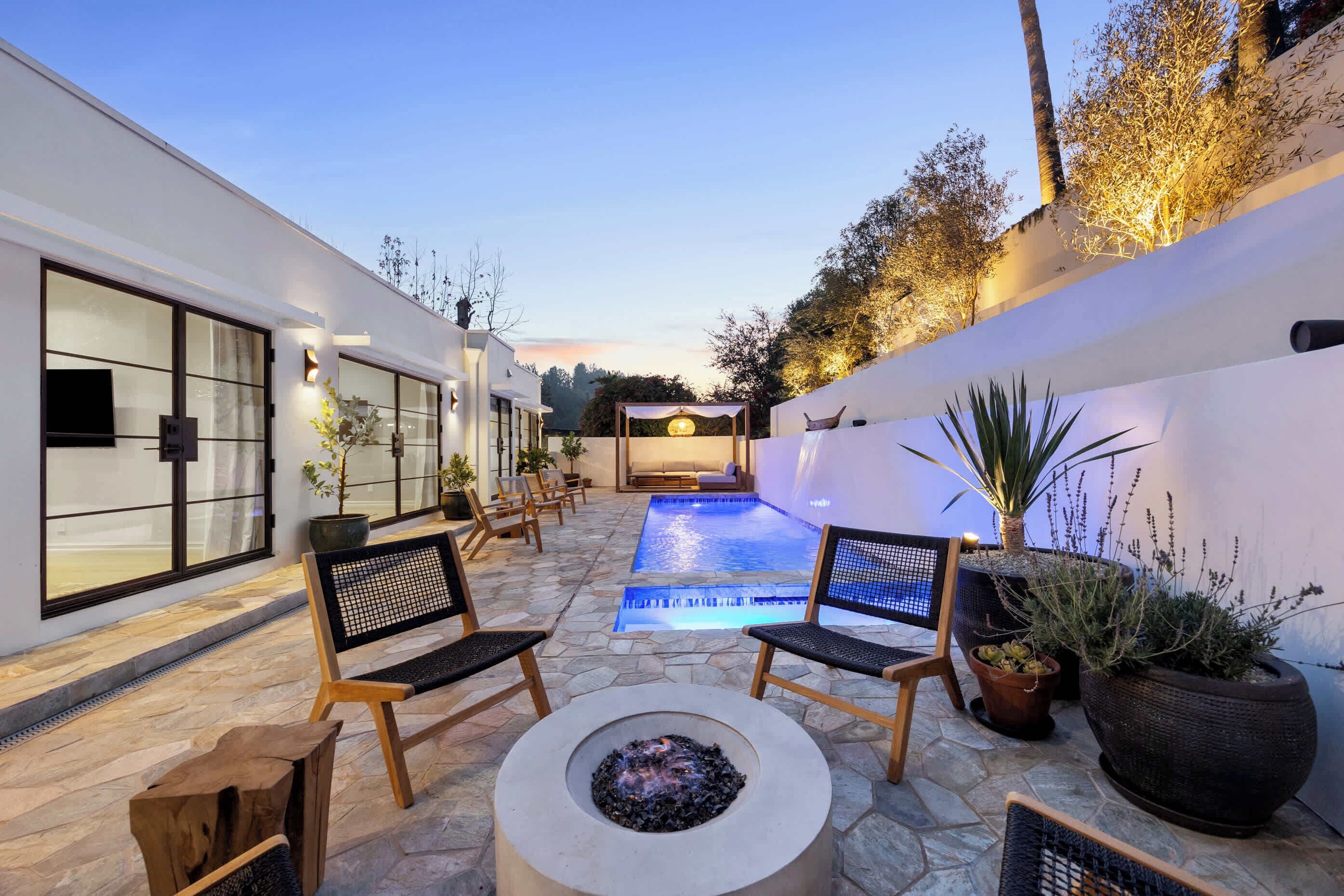 Step into your private oasis, where firelit evenings meet poolside bliss.