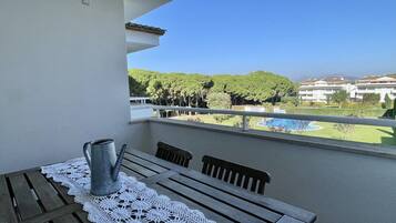 Apartamento | Restaurante al aire libre