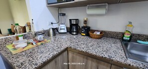 Microwave, oven, stovetop - Spacious 3-bedroom bungalow with AC Entire house , WiFi in San Juan Opico. (San Juan Opico)