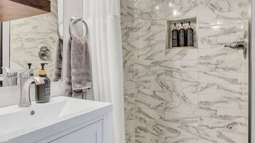 Shower, hair dryer, towels