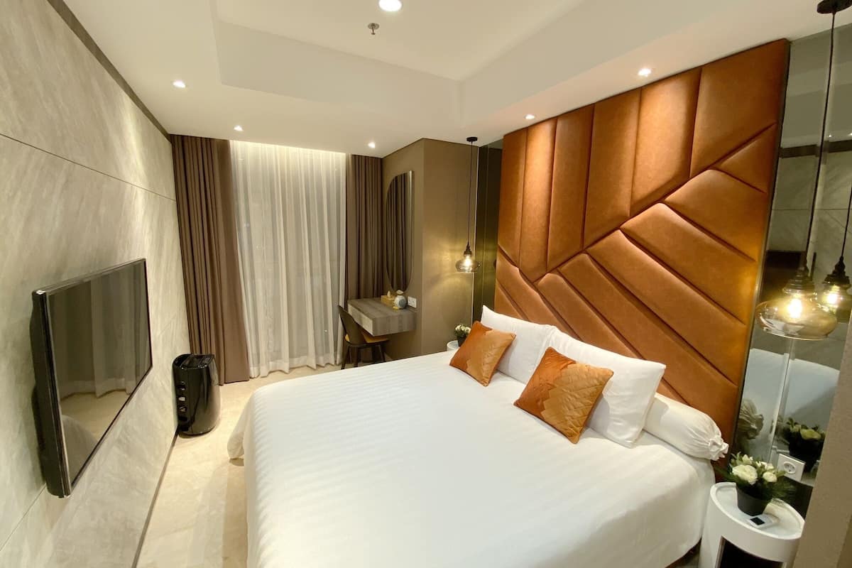 Familiekamer, 1 kingsize bed | 1 slaapkamer, luxe beddengoed, pillowtop-bedden, individueel gedecoreerd
