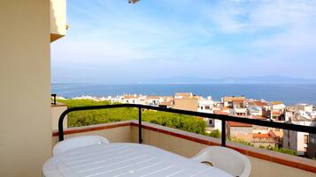 Apartamento | Restaurante al aire libre