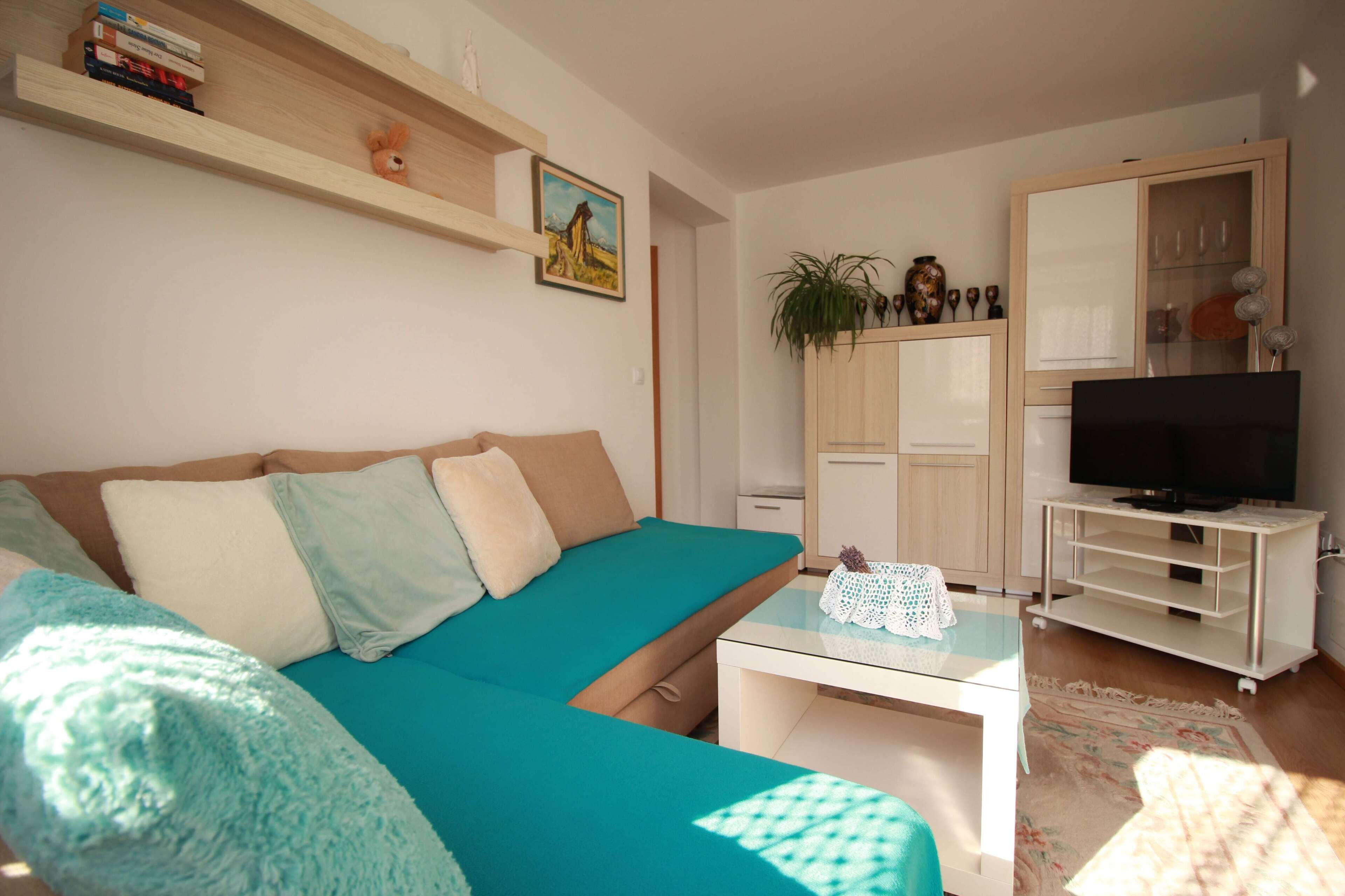 Comfort-Apartment, Gartenblick | Wohnzimmer | Flachbildfernseher