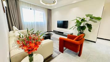 Deluxe Apartment, 3 Bedrooms, Balcony, City View | Living area