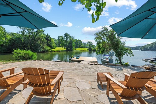 Experience the perfect blend of rustic charm and modern luxury in this Claytor lakefront retreat