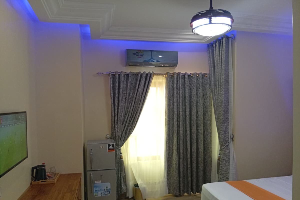 Comfort Double Room Single Use, City View | 1 bedroom, in-room safe, blackout drapes, soundproofing