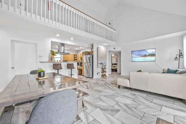 TV, offices - Entire Waterfront House Steps from the Beach (Cocoa Beach)