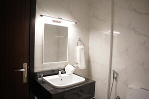 Hair dryer, towels, soap, toilet paper