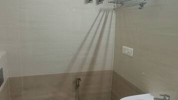 Deluxe Double Room, 1 King Bed, Ground Floor | Bathroom | Shower, free toiletries, slippers, bidet