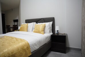 1 غرفة نوم ومكواة/لوح كي وواي فاي وملاءات أسرّة