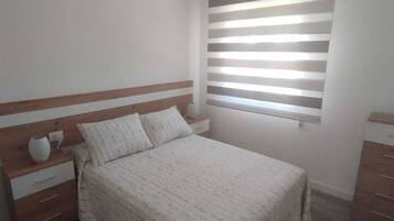 2 dormitorios, tabla de planchar con plancha, wifi