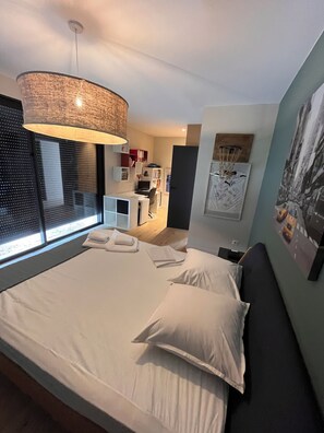 4 slaapkamers, een strijkplank/strijkijzer, wifi