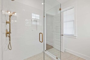 Shower, hair dryer, towels