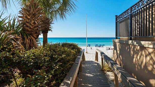 A wooden pathway leading to a beach with a clear view of the ocean. - Stairway to Hammock Heaven * Private Pool * Seasonal 2 Beach Sets (Destin)