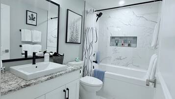 Eco-friendly toiletries, hair dryer, towels, soap