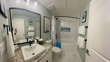 Hair dryer, towels, soap, toilet paper