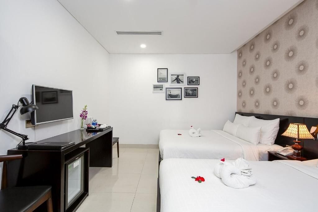 Superior Triple Room | Premium bedding, minibar, desk, laptop workspace