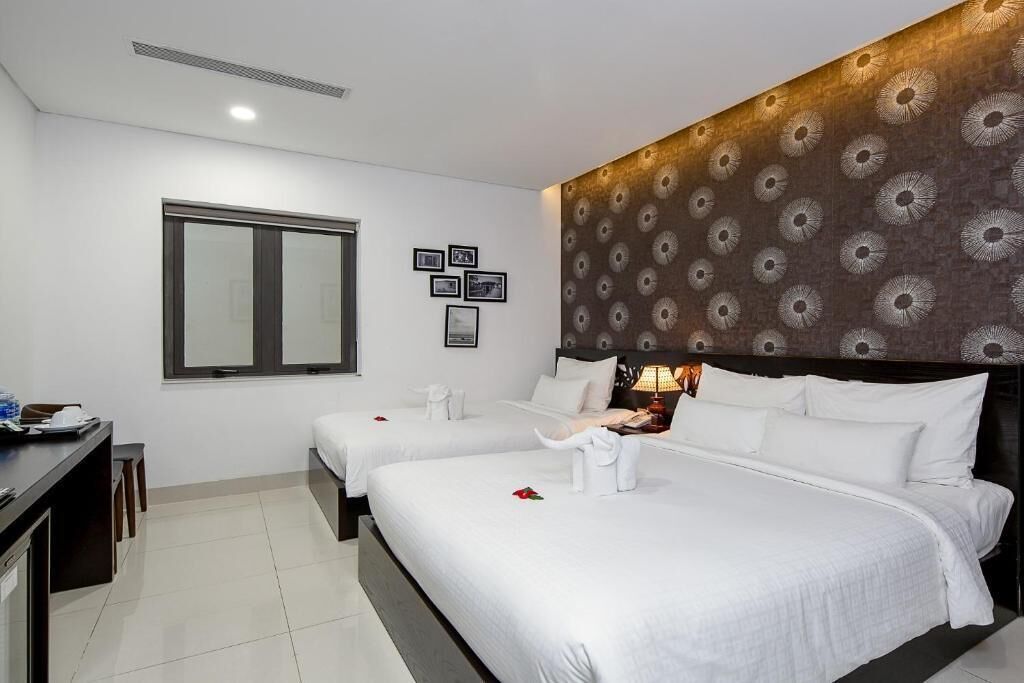Deluxe Triple Room | Premium bedding, minibar, desk, laptop workspace