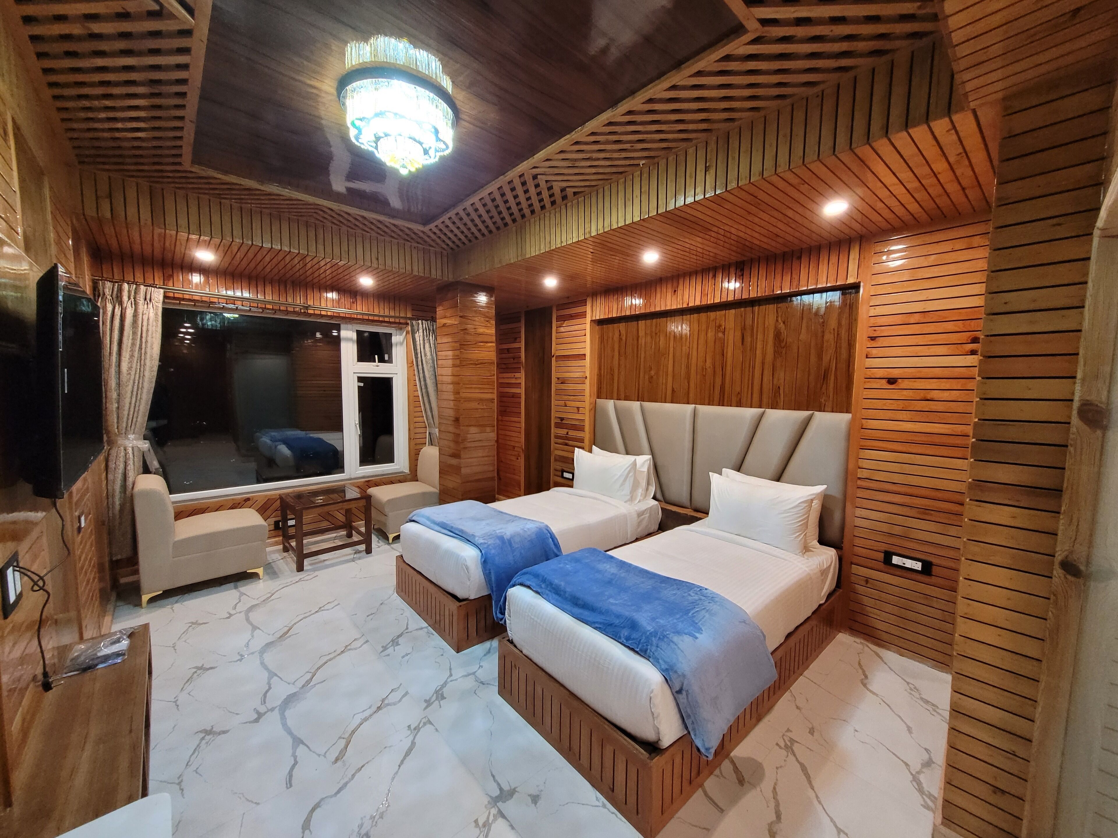 Premium bedding, memory foam beds, desk, laptop workspace