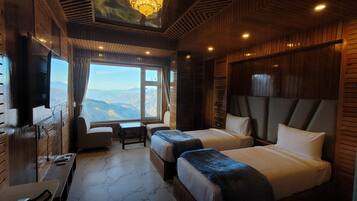 Premium bedding, memory-foam beds, desk, laptop workspace