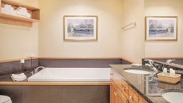 Jetted tub, hair dryer, towels, soap