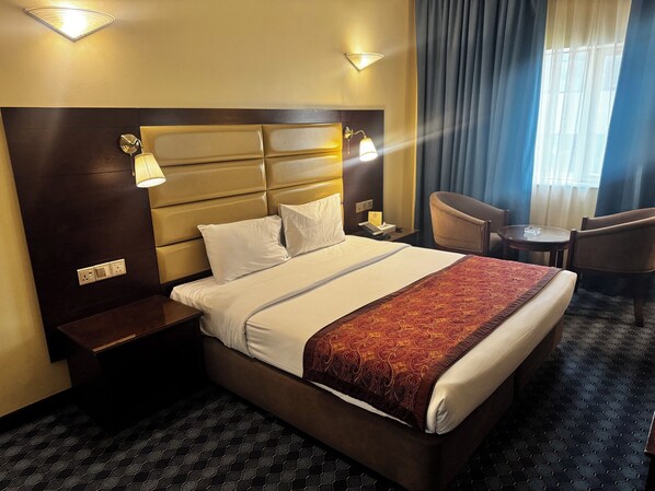 Standard Room, 1 King Bed, City View | Soundproofing, iron/ironing board, free WiFi - ORCHID HOTEL (Dubai)