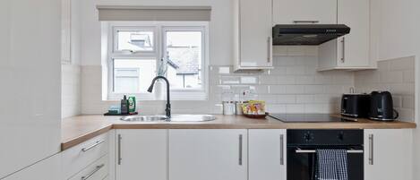 Fridge, oven, electric kettle, toaster