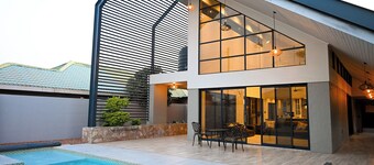 Modern 4-bedroom house in enchanting Victoria Falls with AC, Pool & WiFi