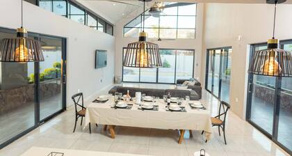 Modern 4-bedroom house in enchanting Victoria Falls with AC, Pool & WiFi