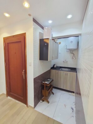 Comfort Studio, Garden View | Private kitchen | Full-size fridge, oven, stovetop, cookware/dishes/utensils - HS STIDUS 1 (Giza)