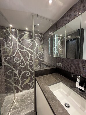 Shower, hair dryer, towels, soap