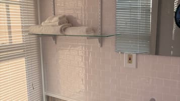 Hair dryer, towels, soap, toilet paper